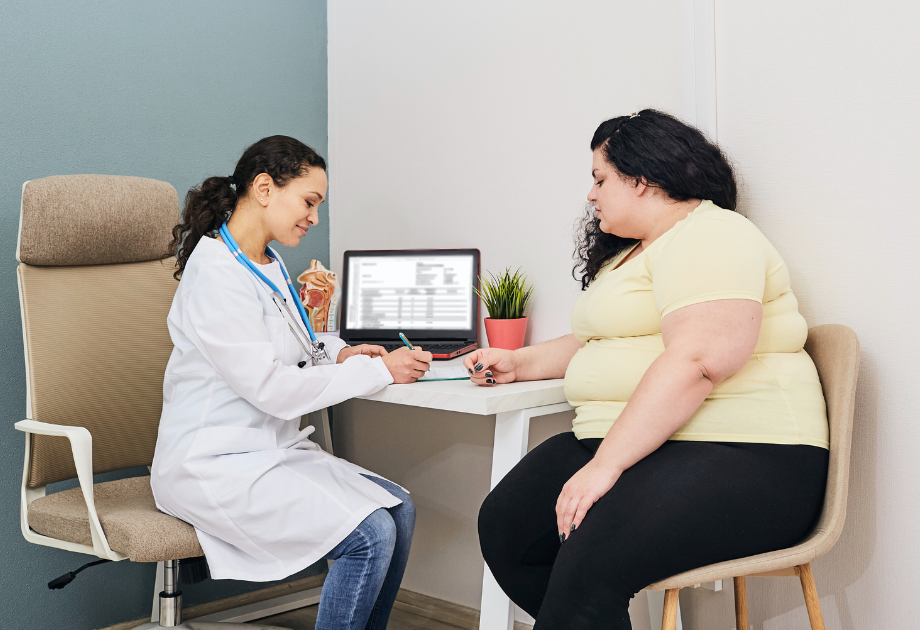 patient and doctor looking at papers